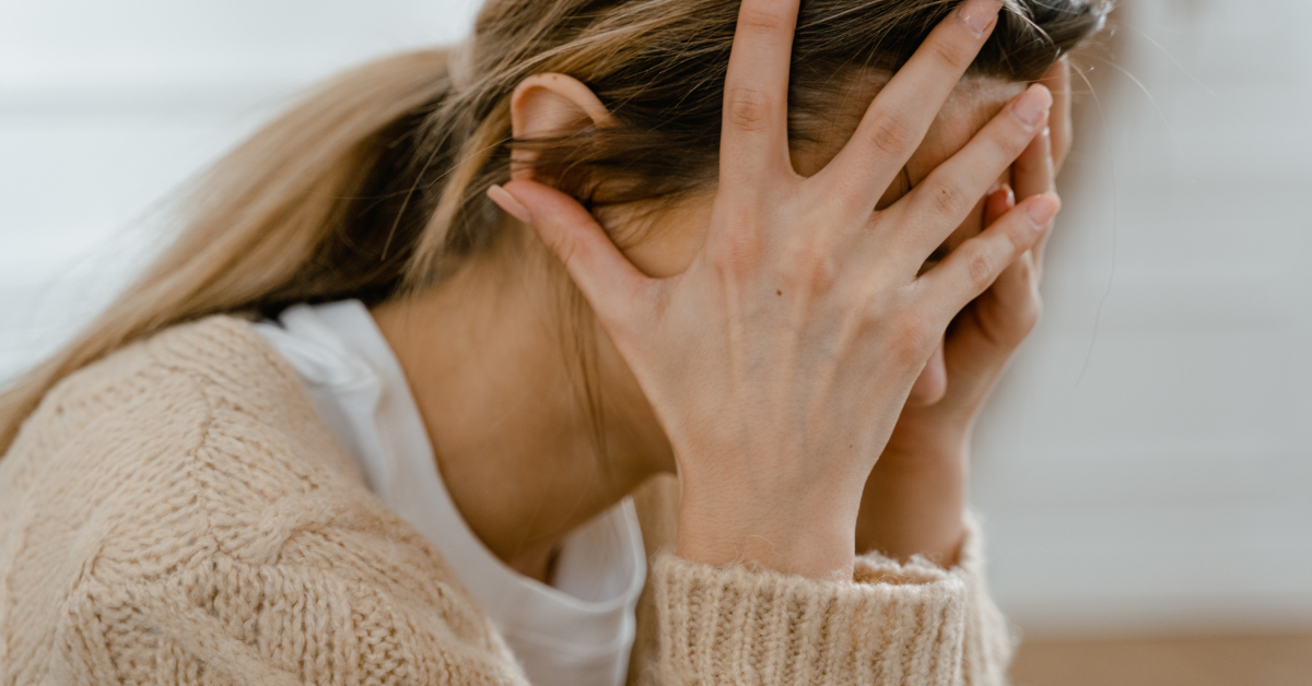 woman feeling broken and sad after tubal litigation